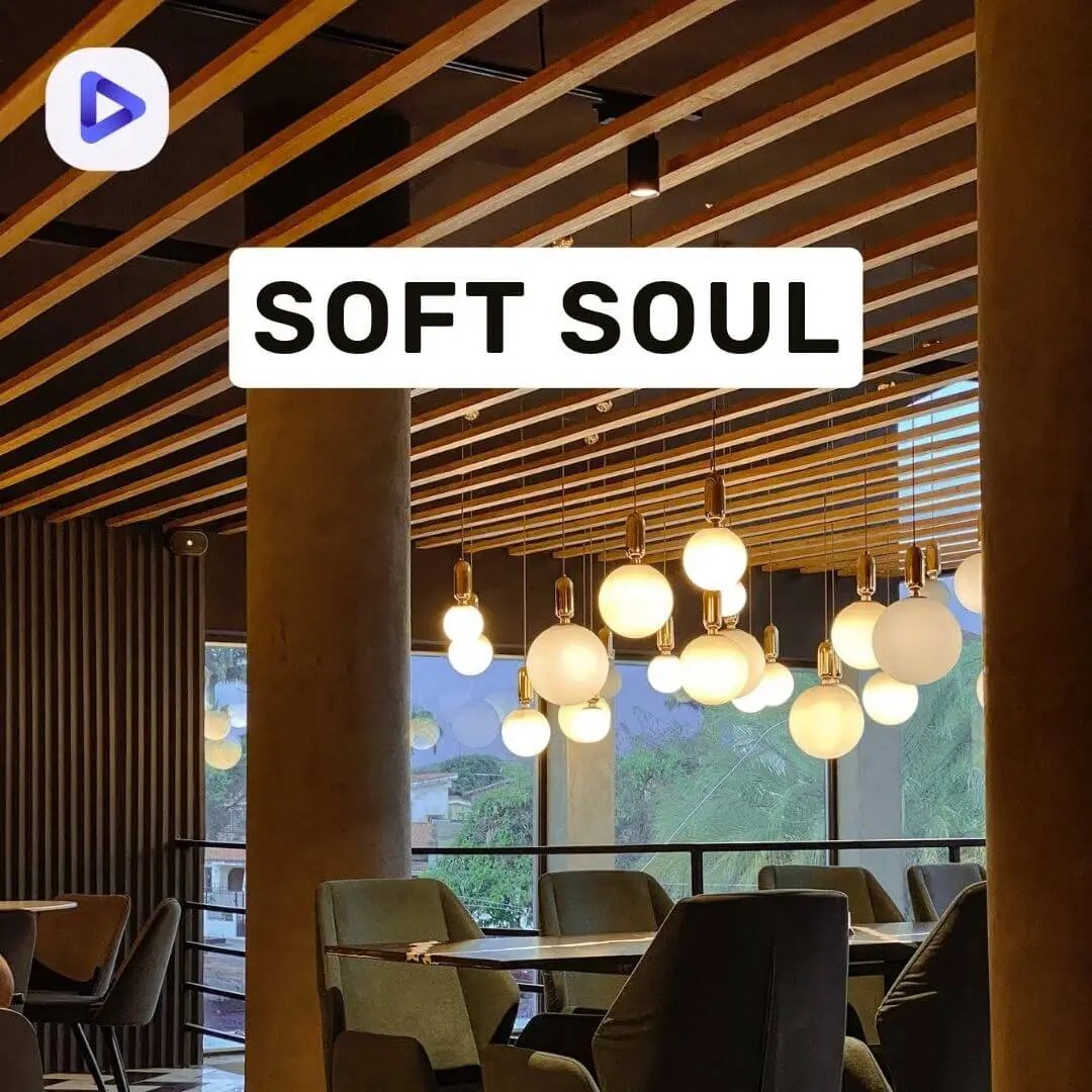 Lobby space with wooden posts, round lamps, green chairs, wooden tables, and the text: Soft Soul.