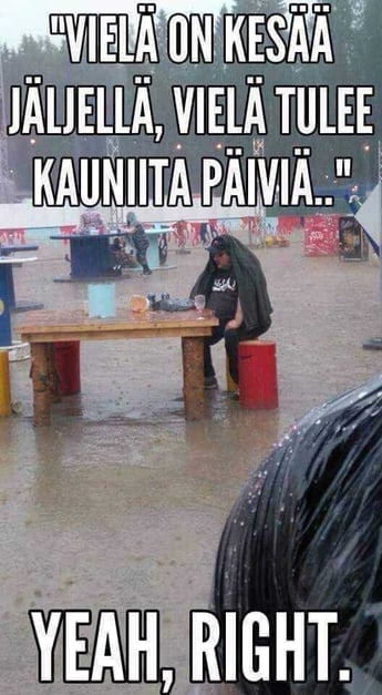 A person sitting in the rain with the text: "Vielä on kesää jäljellä, vielä tulee kauniita päiviä.. Yeah, right.