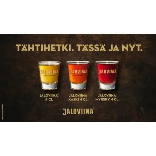 Kolme shottilasia ja teksti: Tähtihetki. Tässä ja nyt. Jaloviina.