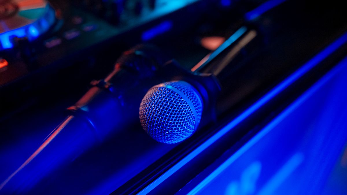 Two microphones in blue-ish lighting.